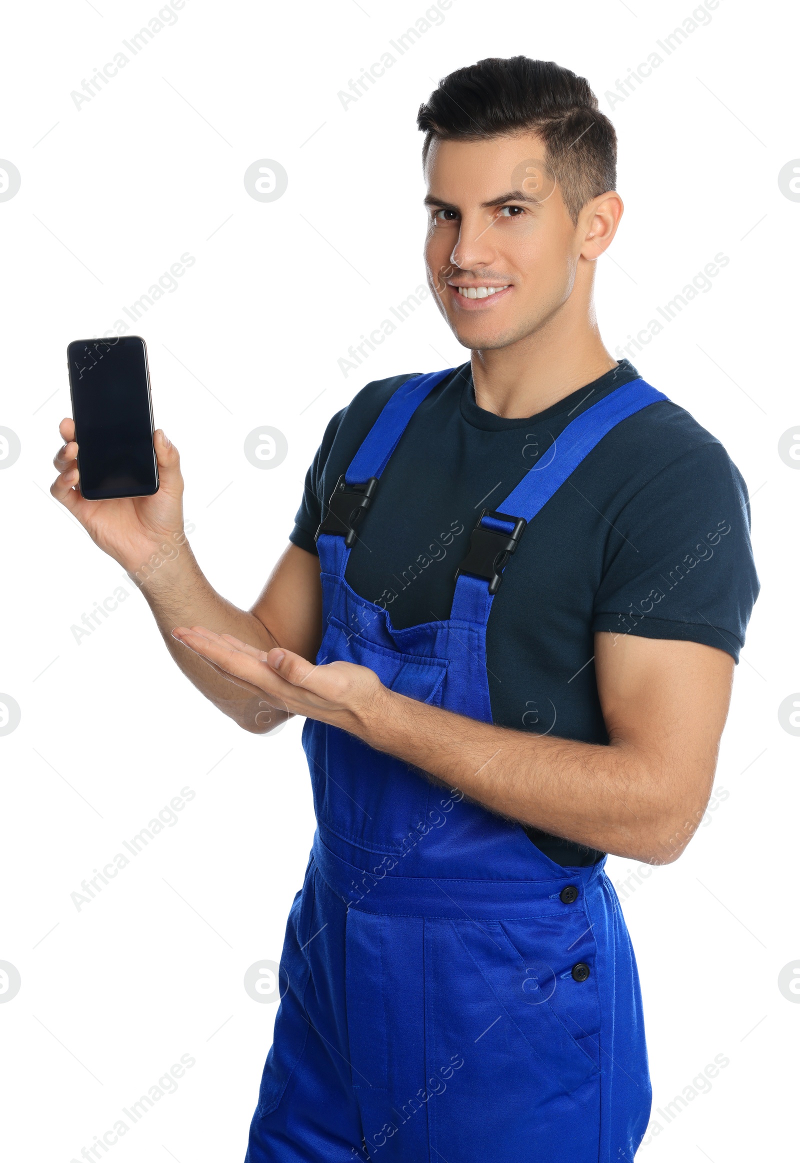 Photo of Repairman with modern smartphone on white background