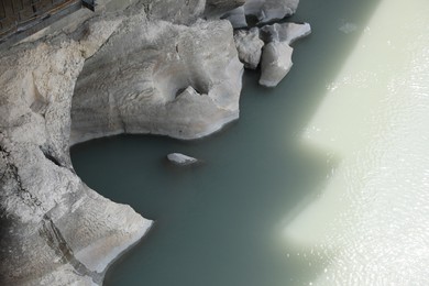 Picturesque view of clear river and rocks on sunny day