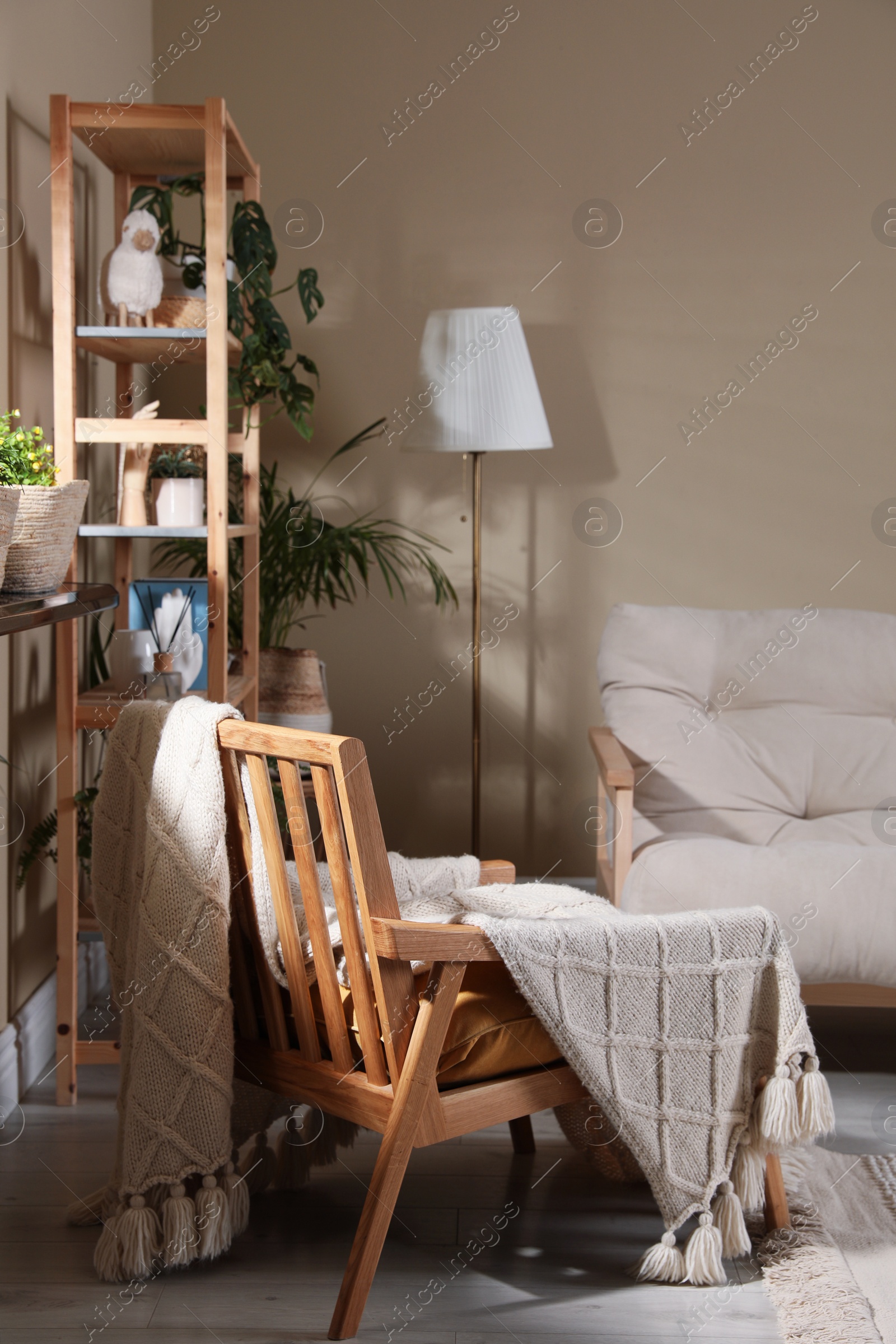 Photo of Stylish living room interior with comfortable sofa