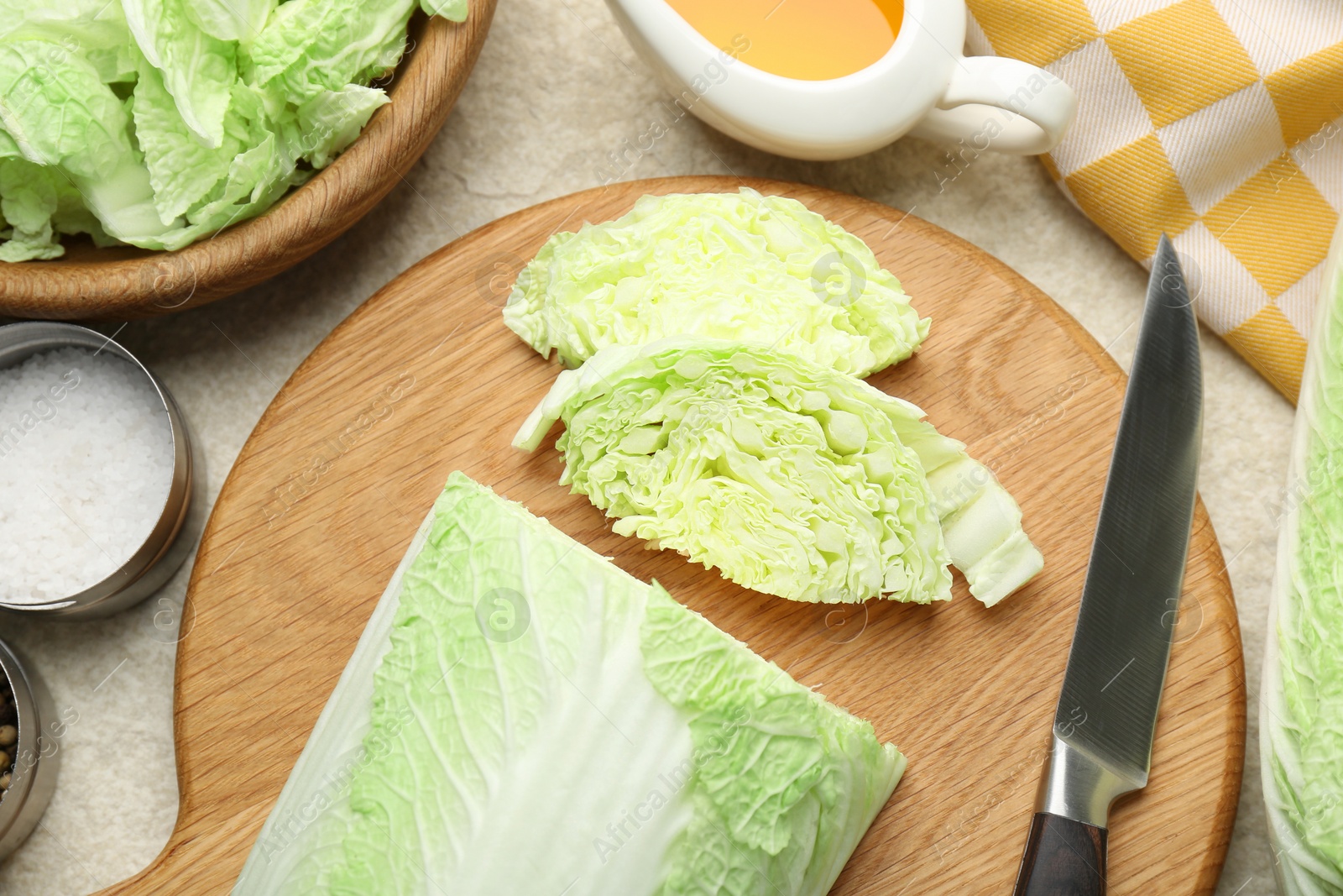 Photo of Cut fresh Chinese cabbage, oil and spices on light table, flat lay