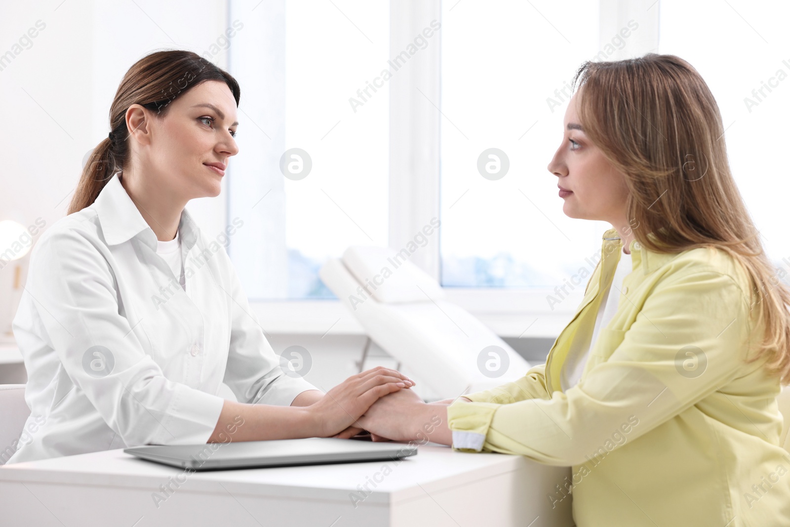 Photo of Mammologist's appointment. Doctor and woman in hospital