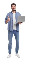 Happy man with laptop showing thumb up on white background