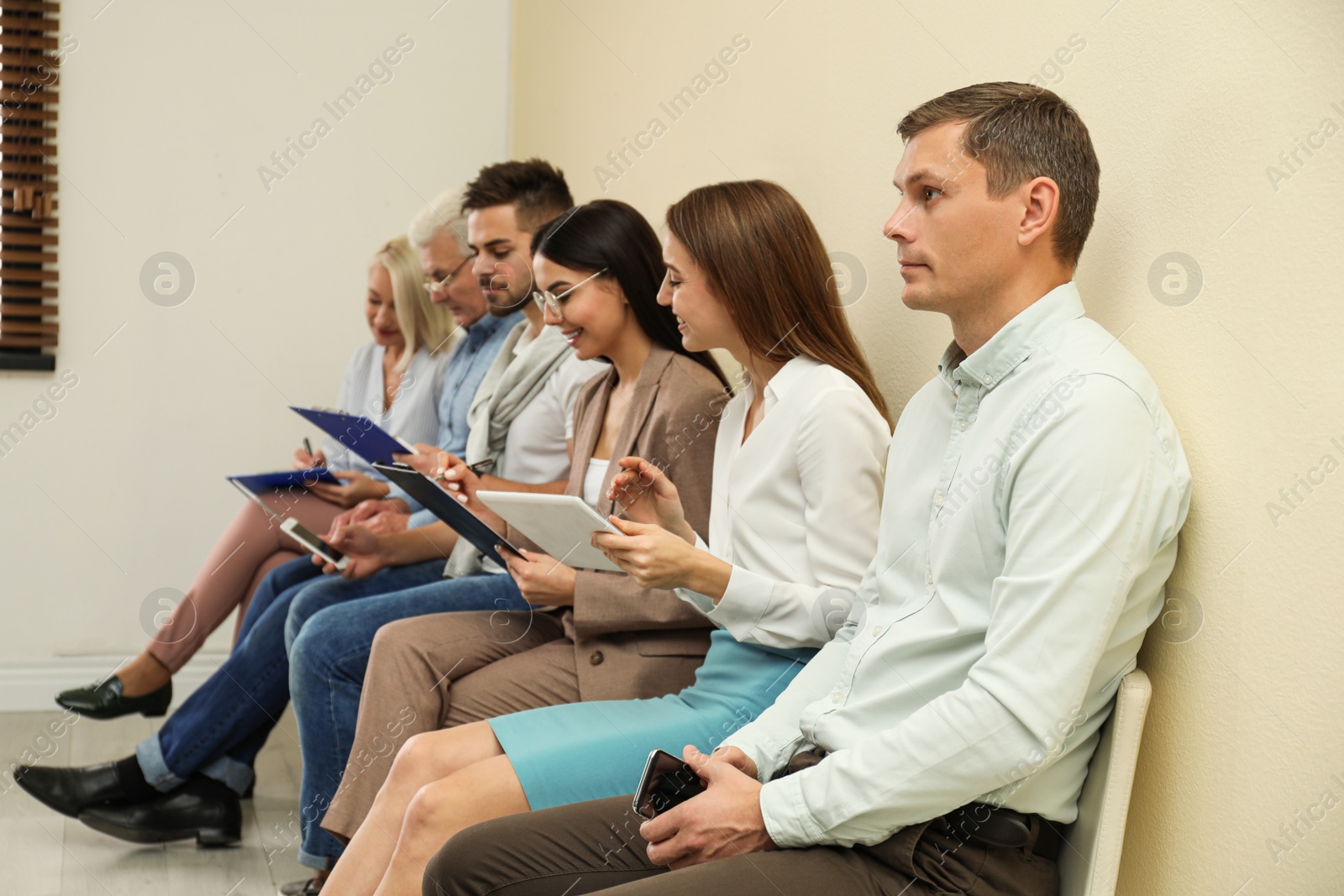 Photo of People waiting for job interview in office