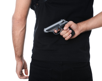 Professional killer with gun on white background, closeup