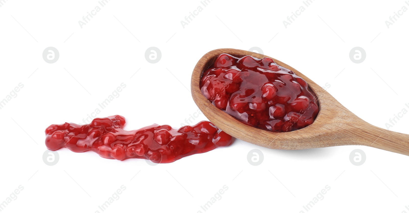 Photo of Spoon with fresh cranberry sauce isolated on white