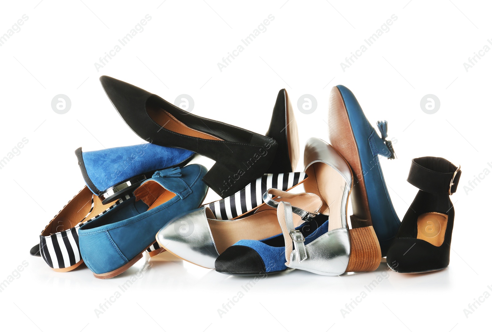 Photo of Many different female shoes on white background