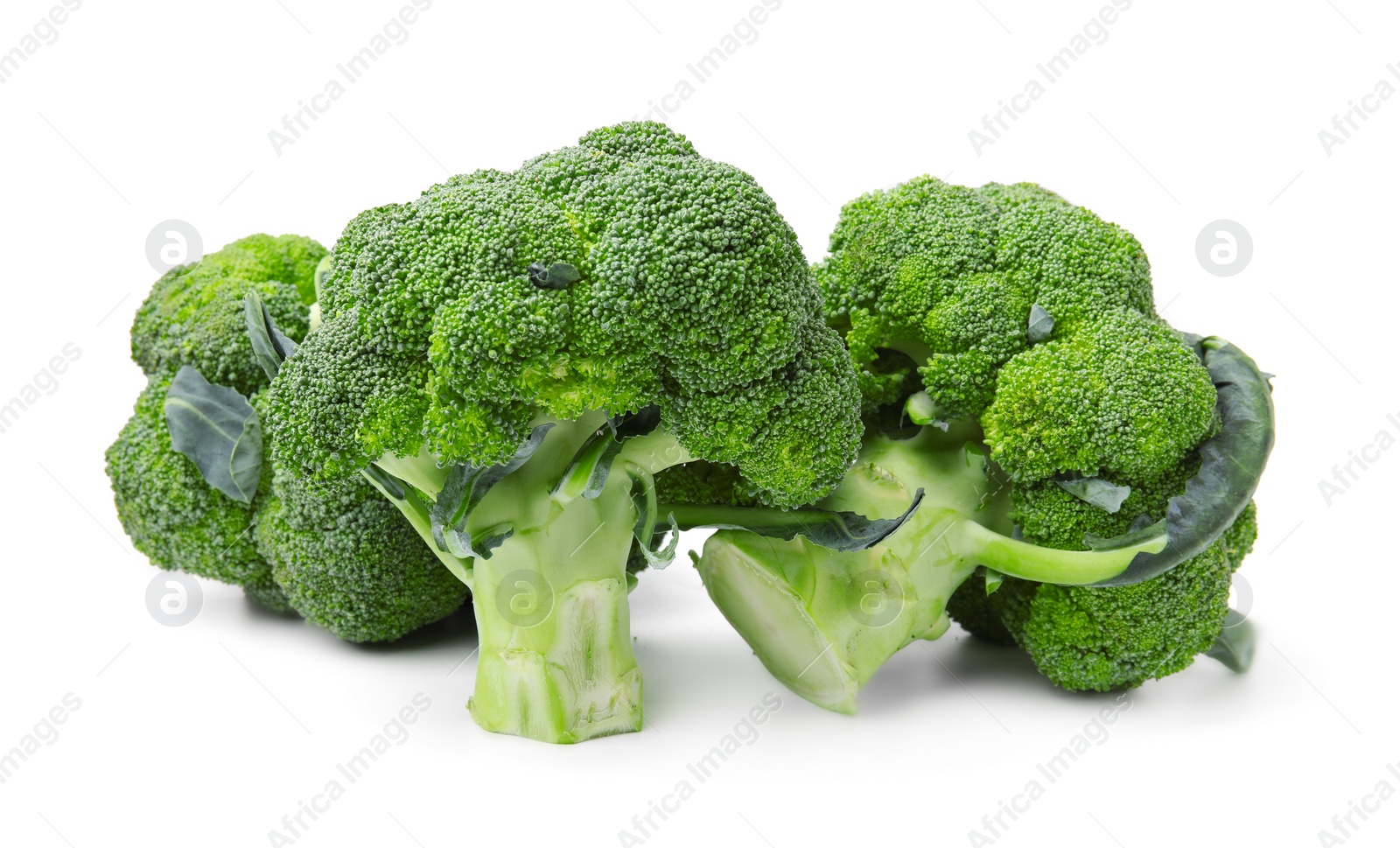 Photo of Pile of fresh raw green broccoli isolated on white