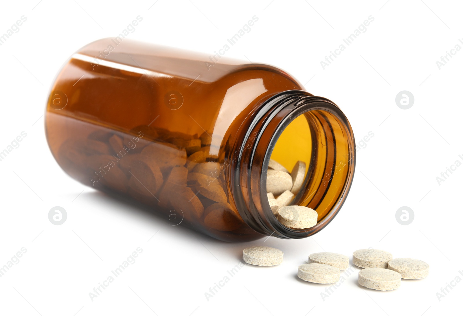 Photo of Bottle with vitamin pills isolated on white