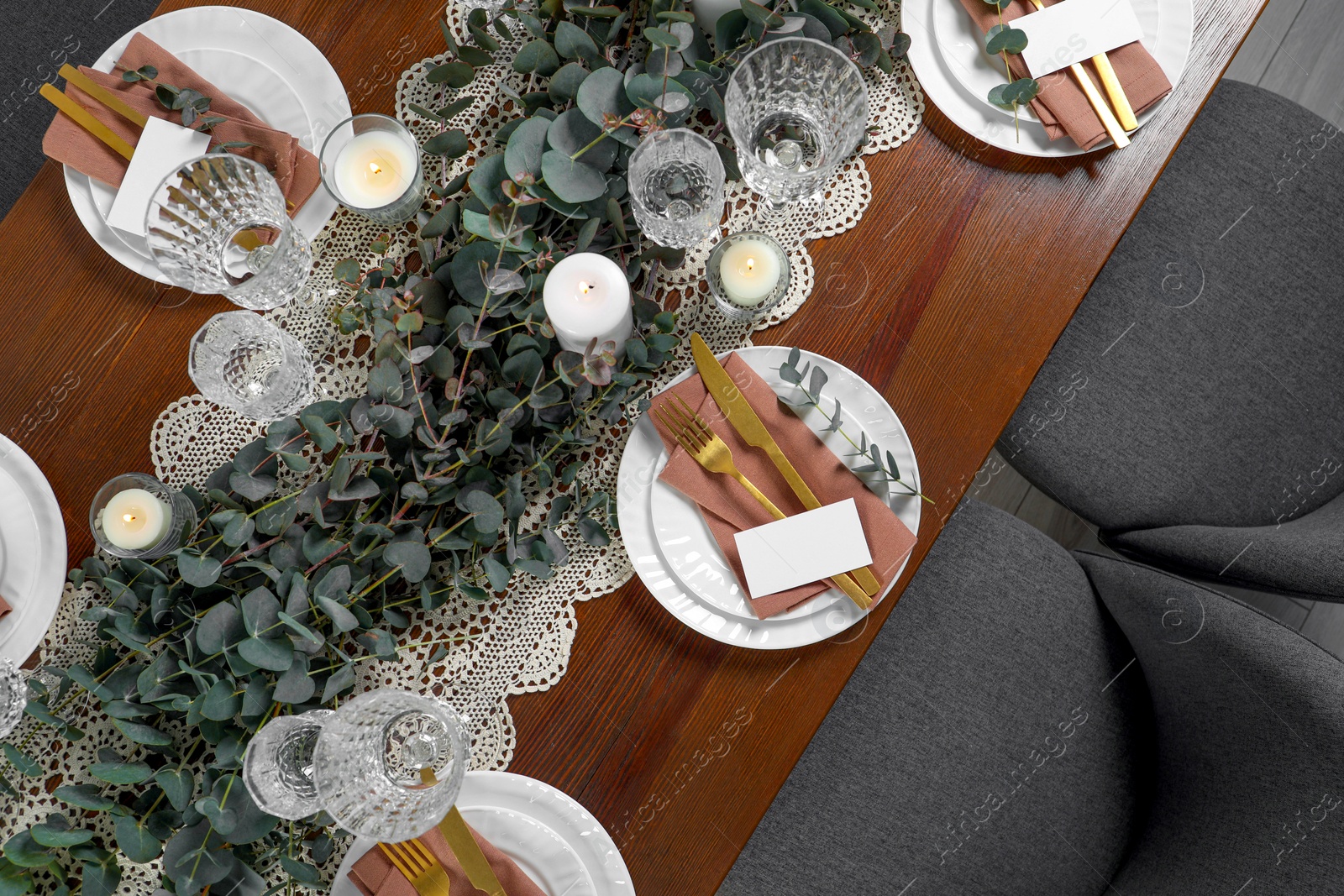 Photo of Luxury table setting with beautiful decor and blank cards, flat lay. Festive dinner