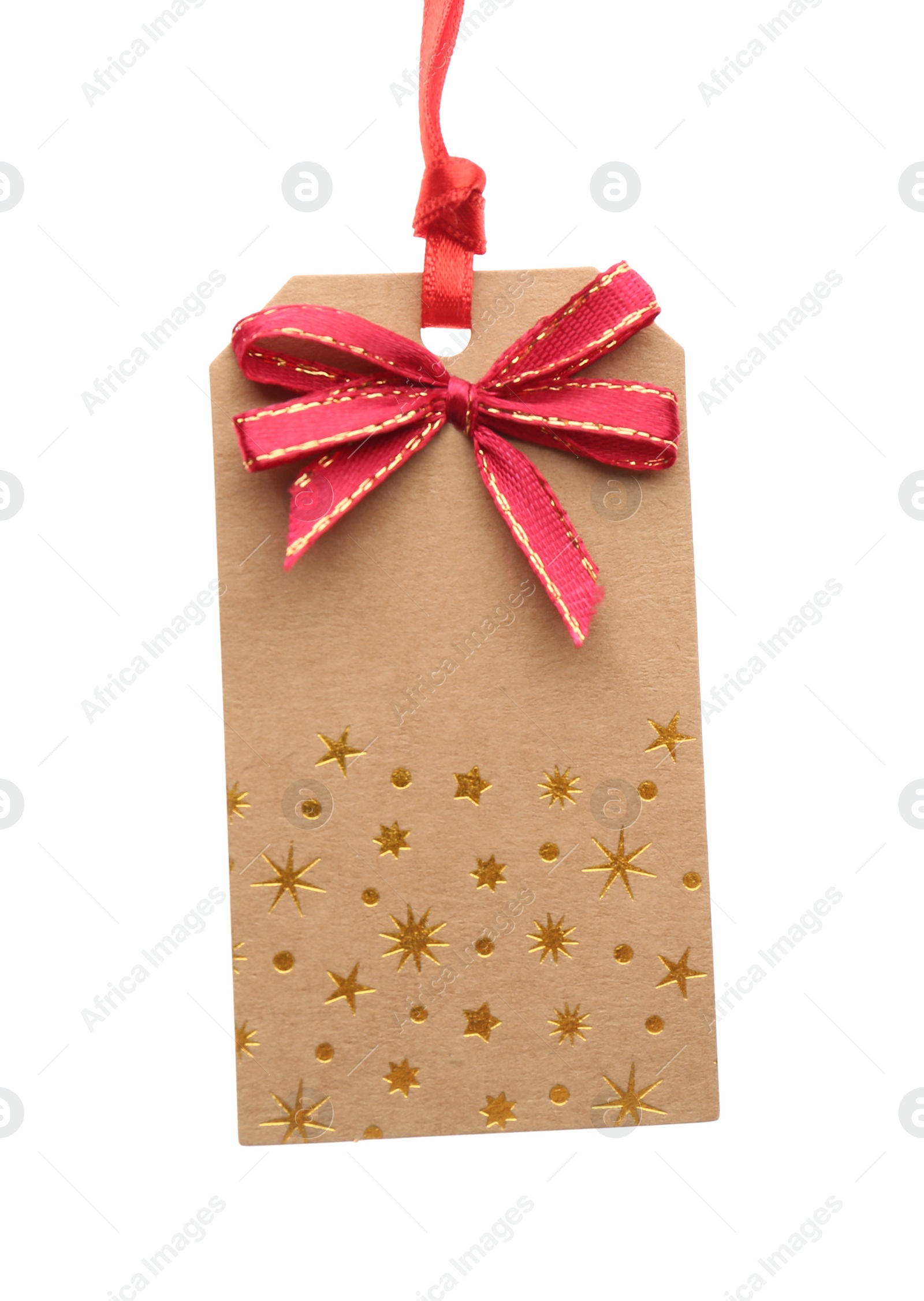 Photo of Cardboard gift tag with red bow isolated on white