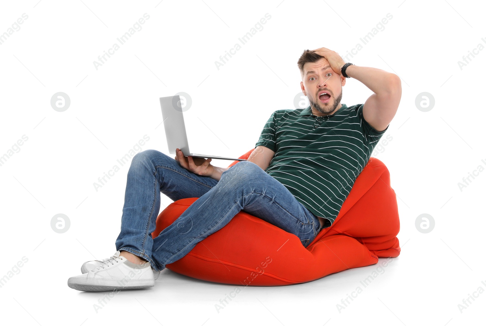 Photo of Emotional man with laptop on white background