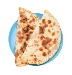 Plate with delicious calzones on white background, top view