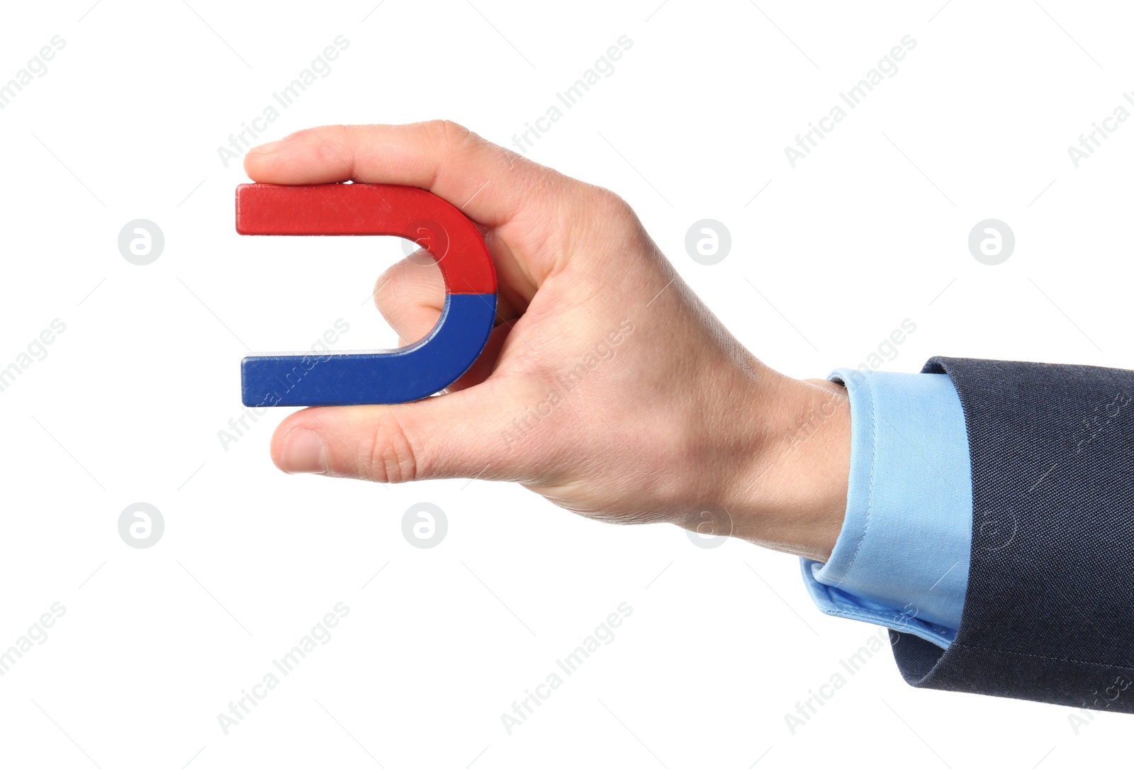 Photo of Man holding magnet on white background, closeup