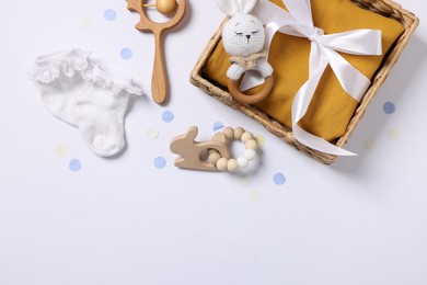 Flat lay composition with different baby accessories on white background. Space for text