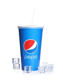 Photo of MYKOLAIV, UKRAINE - JUNE 9, 2021: Paper Pepsi cup with ice cubes isolated on white