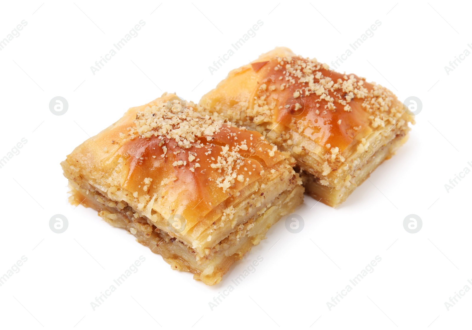 Photo of Eastern sweets. Pieces of tasty baklava isolated on white