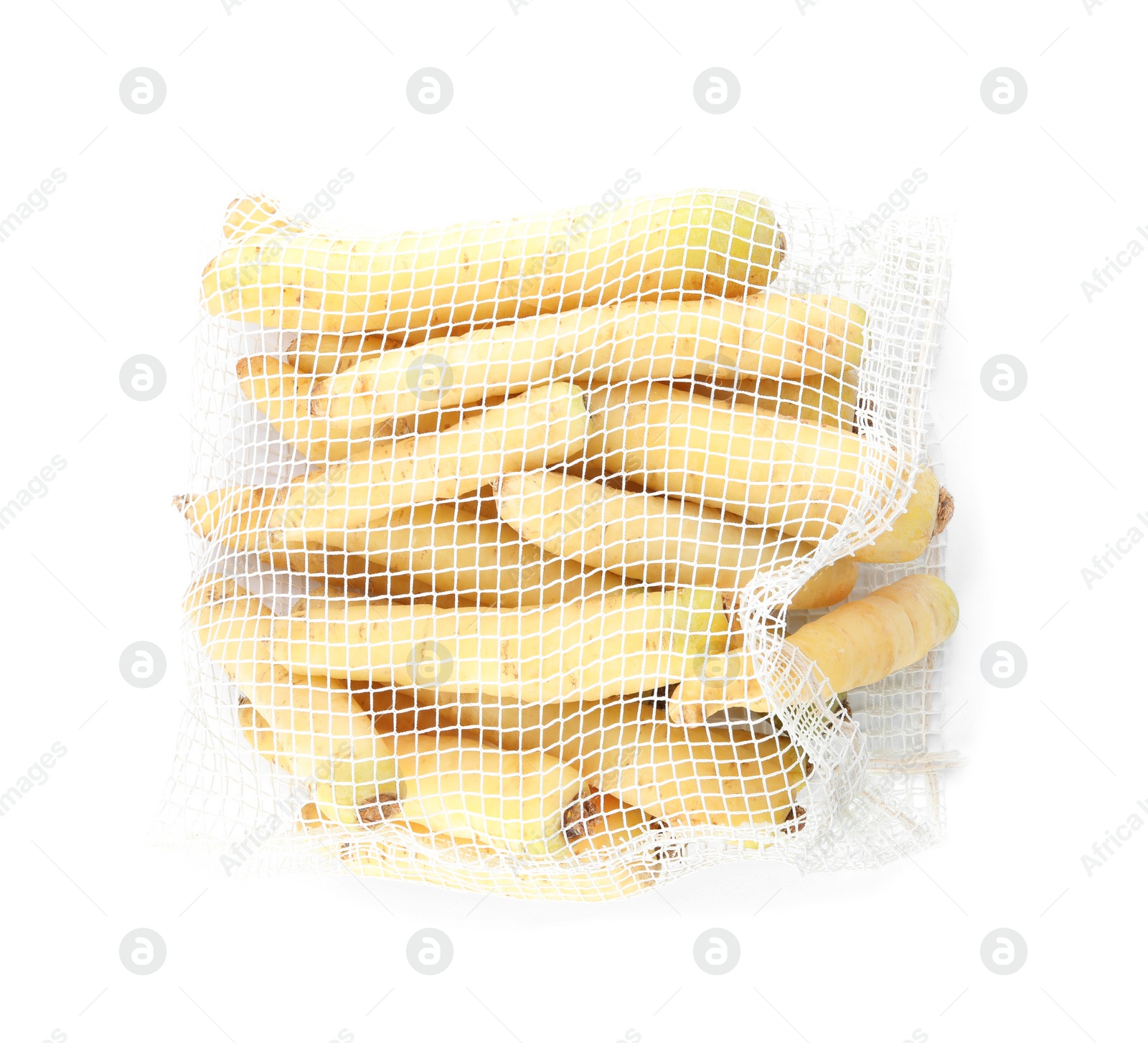 Photo of Raw carrots in mesh bag isolated on white, top view