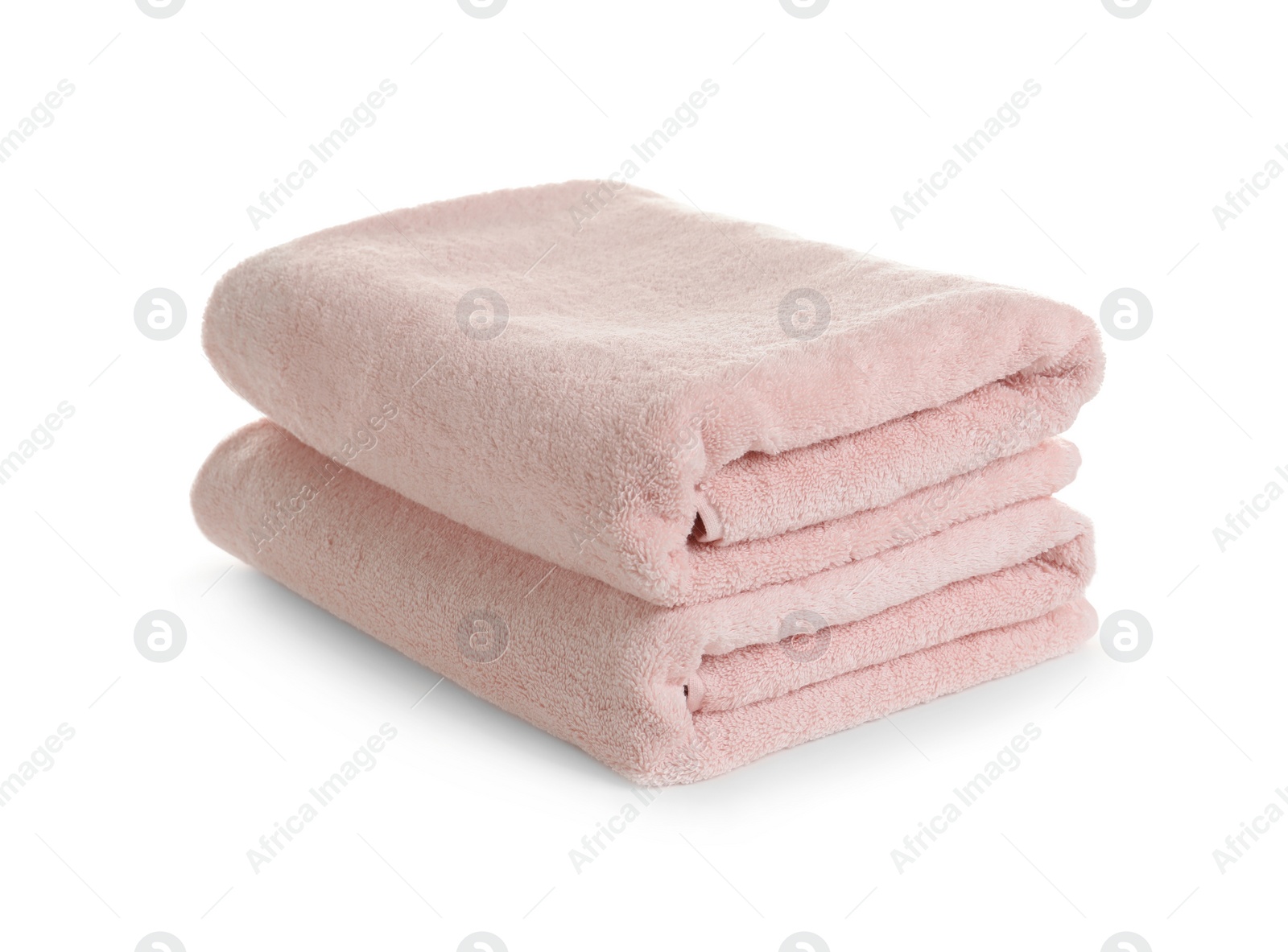 Photo of Stack of clean soft towels on white background