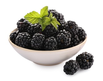 Photo of Tasty ripe blackberries in bowl isolated on white