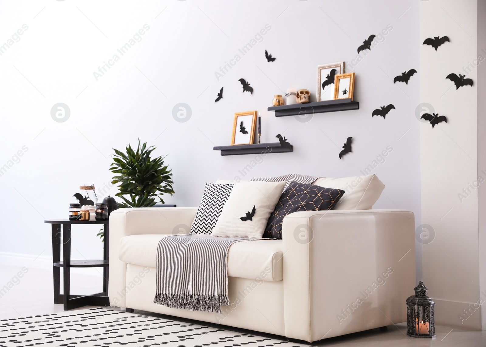 Photo of Modern room decorated for Halloween. Idea for festive interior