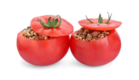 Photo of Delicious stuffed tomatoes with minced beef, bulgur and mushrooms isolated on white