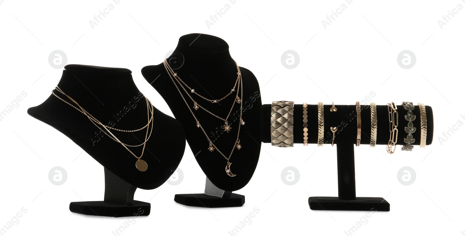 Photo of Different display stands with stylish jewelry on white background