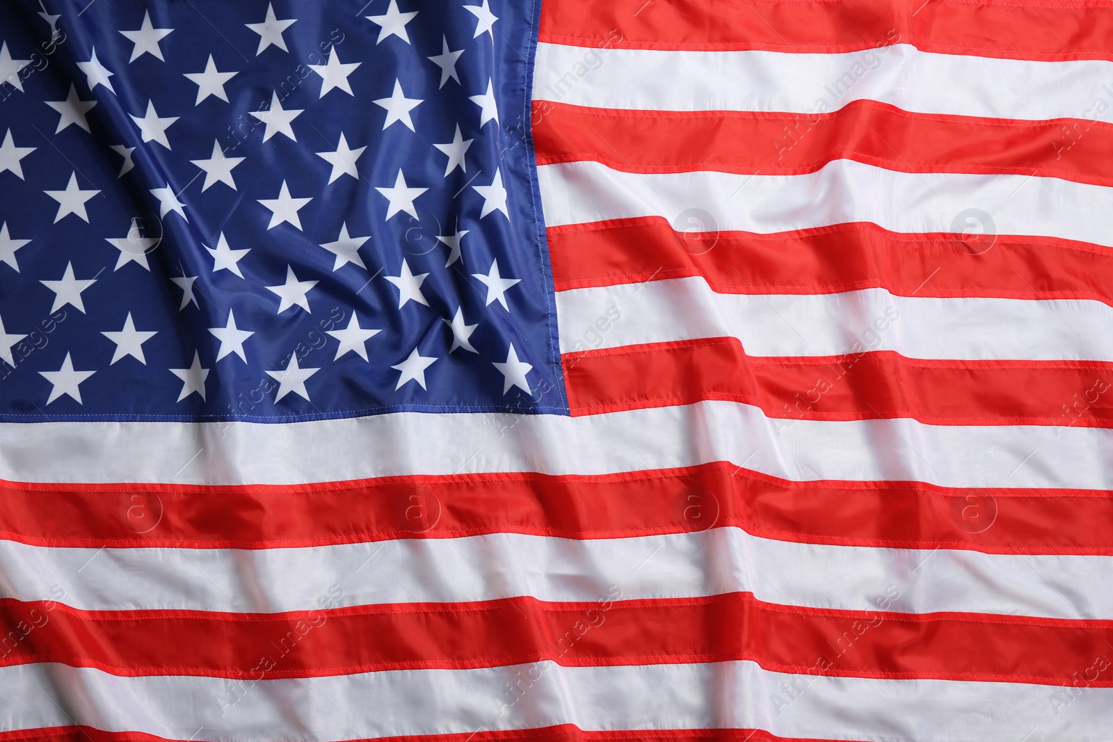 Photo of American flag as background, top view. National symbol of USA