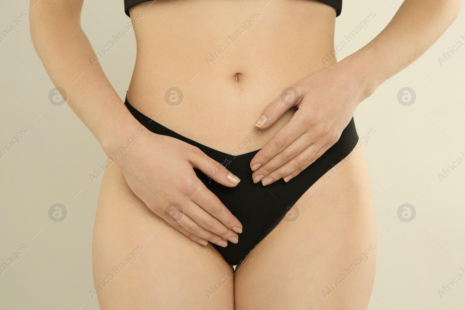 Photo of Gynecology. Woman in underwear on light background, closeup