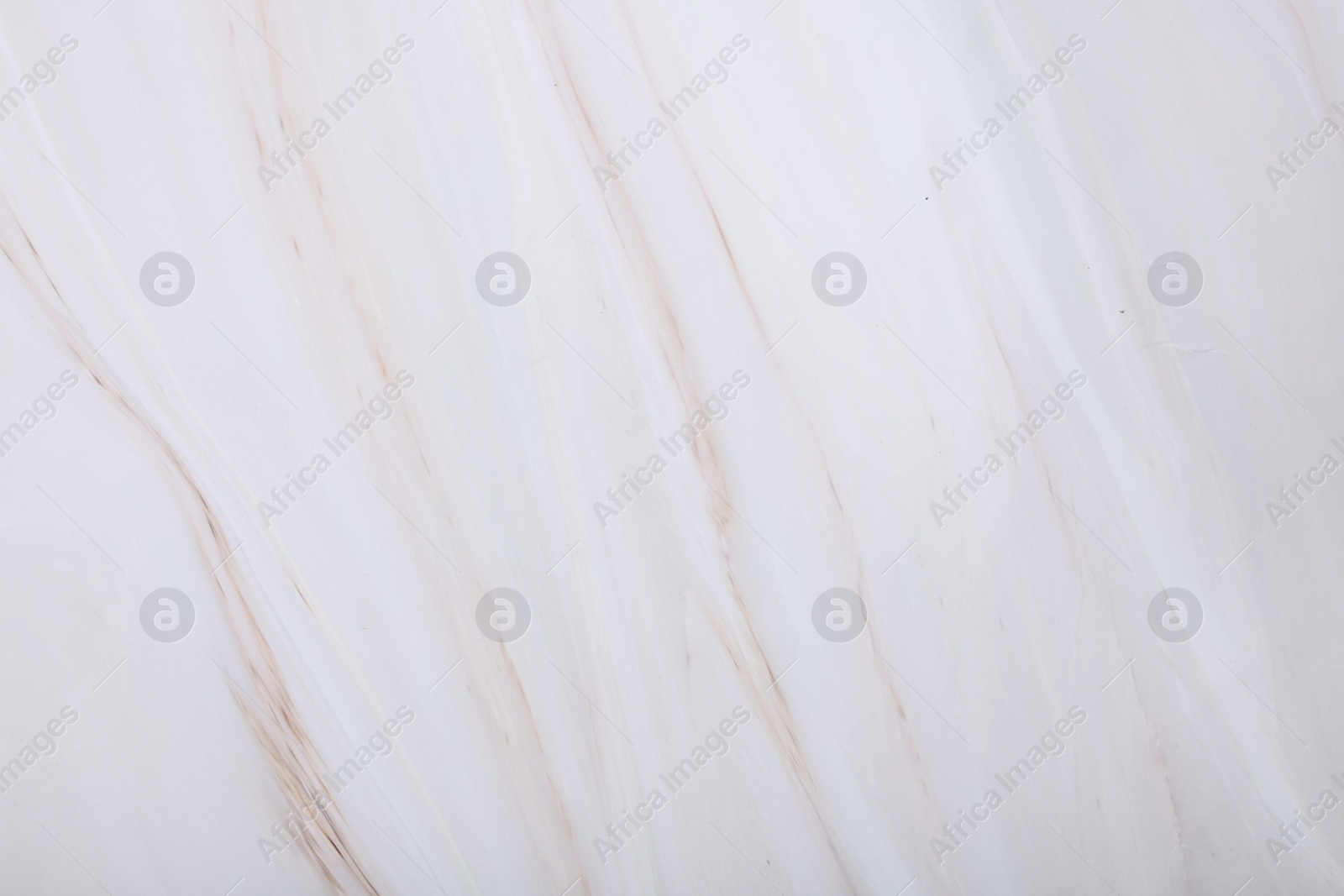 Photo of White marble surface as background, closeup view