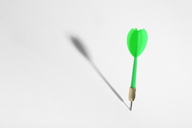 Green dart arrow for game on white background