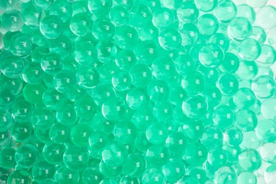 Photo of Top view of mint vase filler as background. Water beads