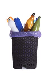 Photo of Trash bin full of plastic bottles on white background. Recycling rubbish