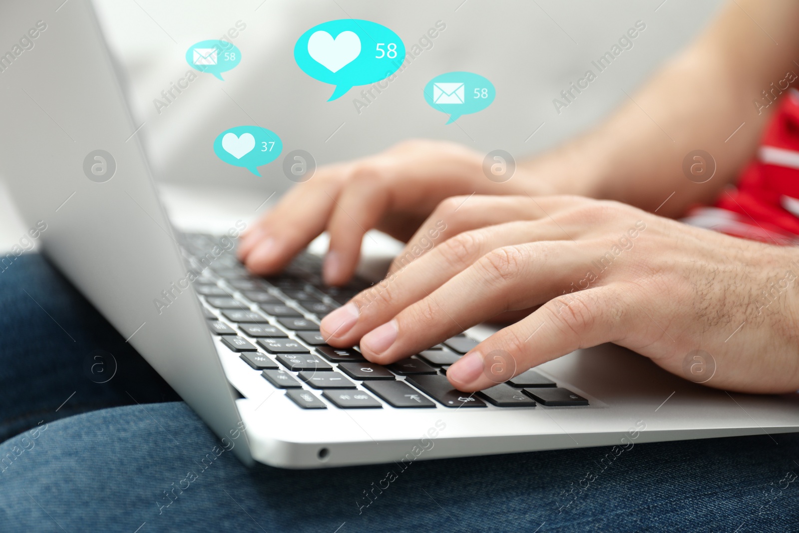 Image of Man using laptop at home, closeup. Social media