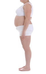 Overweight woman on white background, closeup. Weight loss