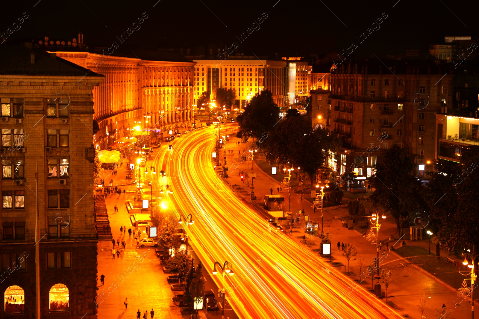 Image of Road traffic, motion blur effect. View of night cityscape with car light trails