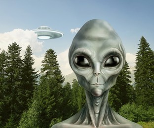 Image of Alien and flying saucer in forest. UFO, extraterrestrial visitors