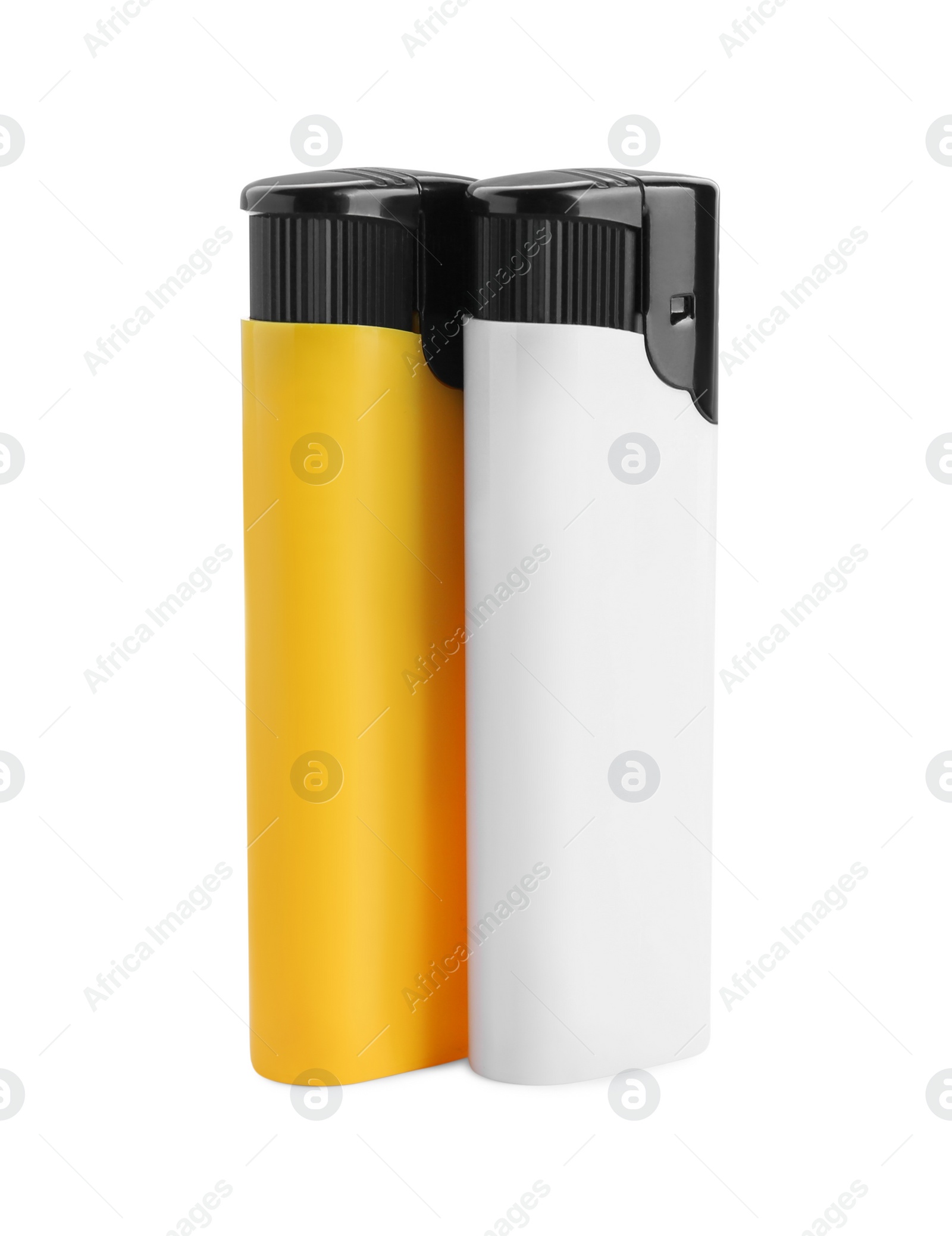 Photo of Stylish small pocket lighters on white background