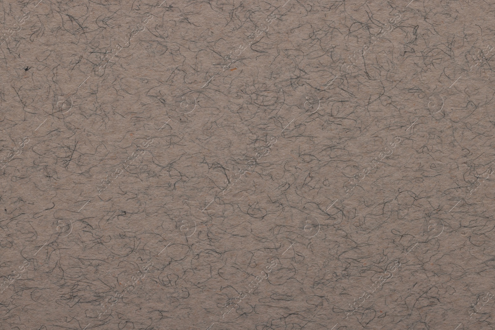 Photo of Texture of grey paper sheet as background, top view