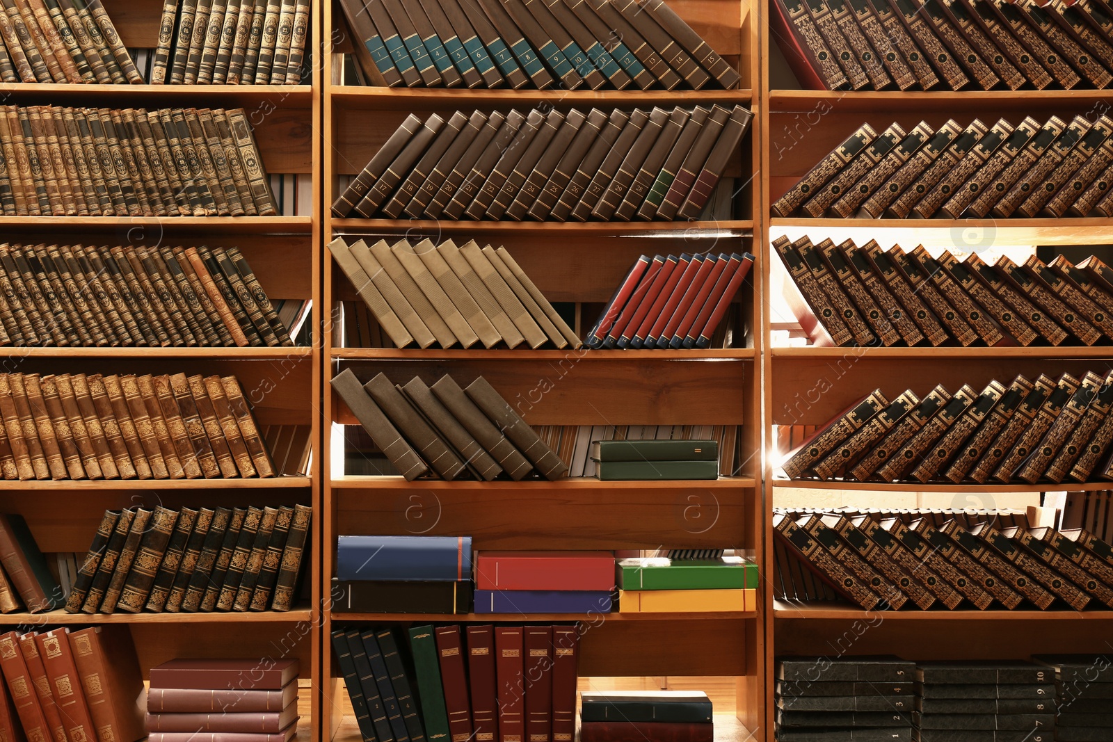 Image of Collection of different books on shelves in library