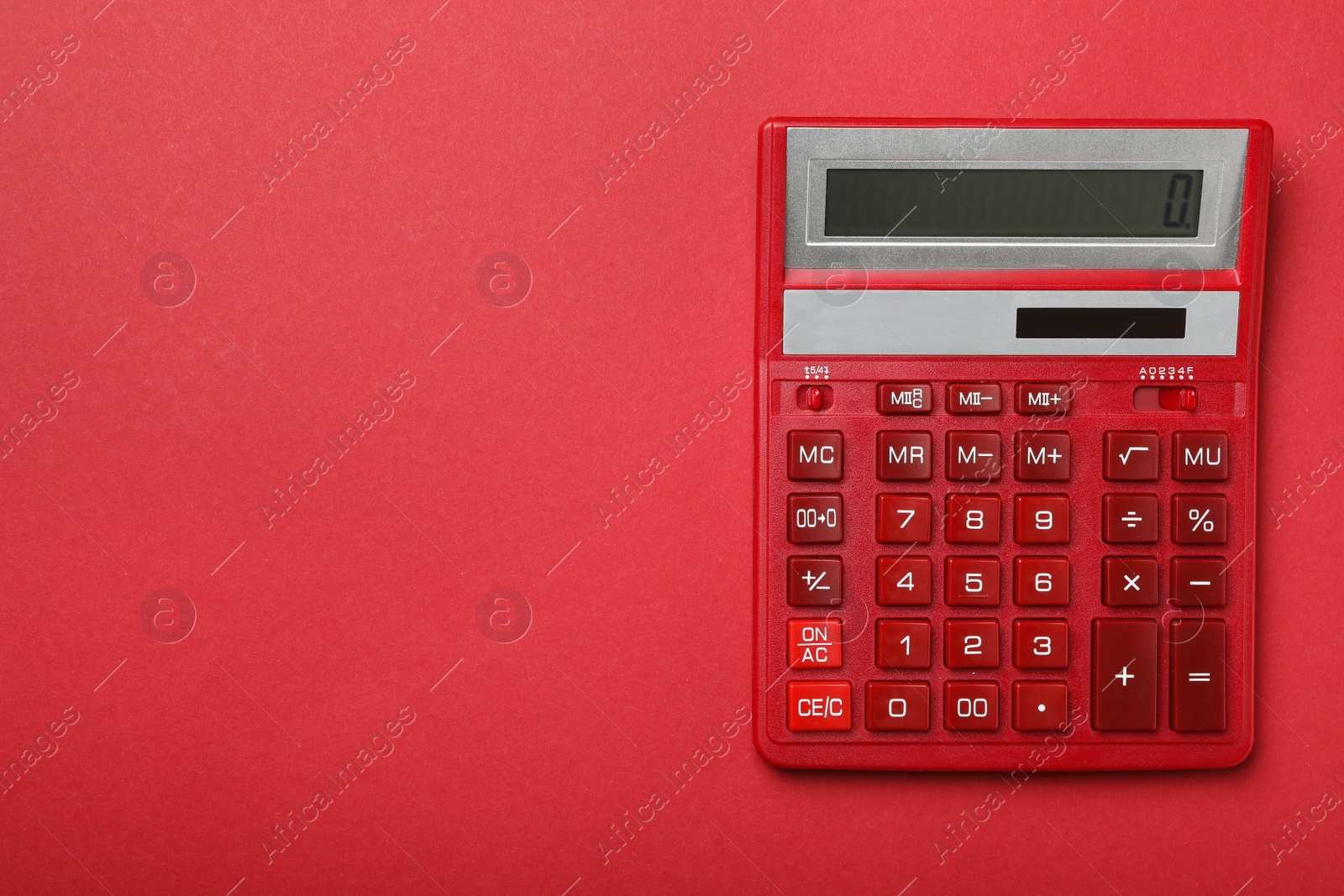 Photo of Calculator on red background, top view with space for text. Tax accounting concept