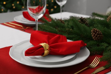 Photo of Beautiful table setting with Christmas decor indoors