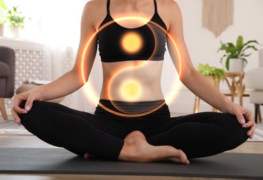 Woman meditating at home, closeup. Yin and yang symbol