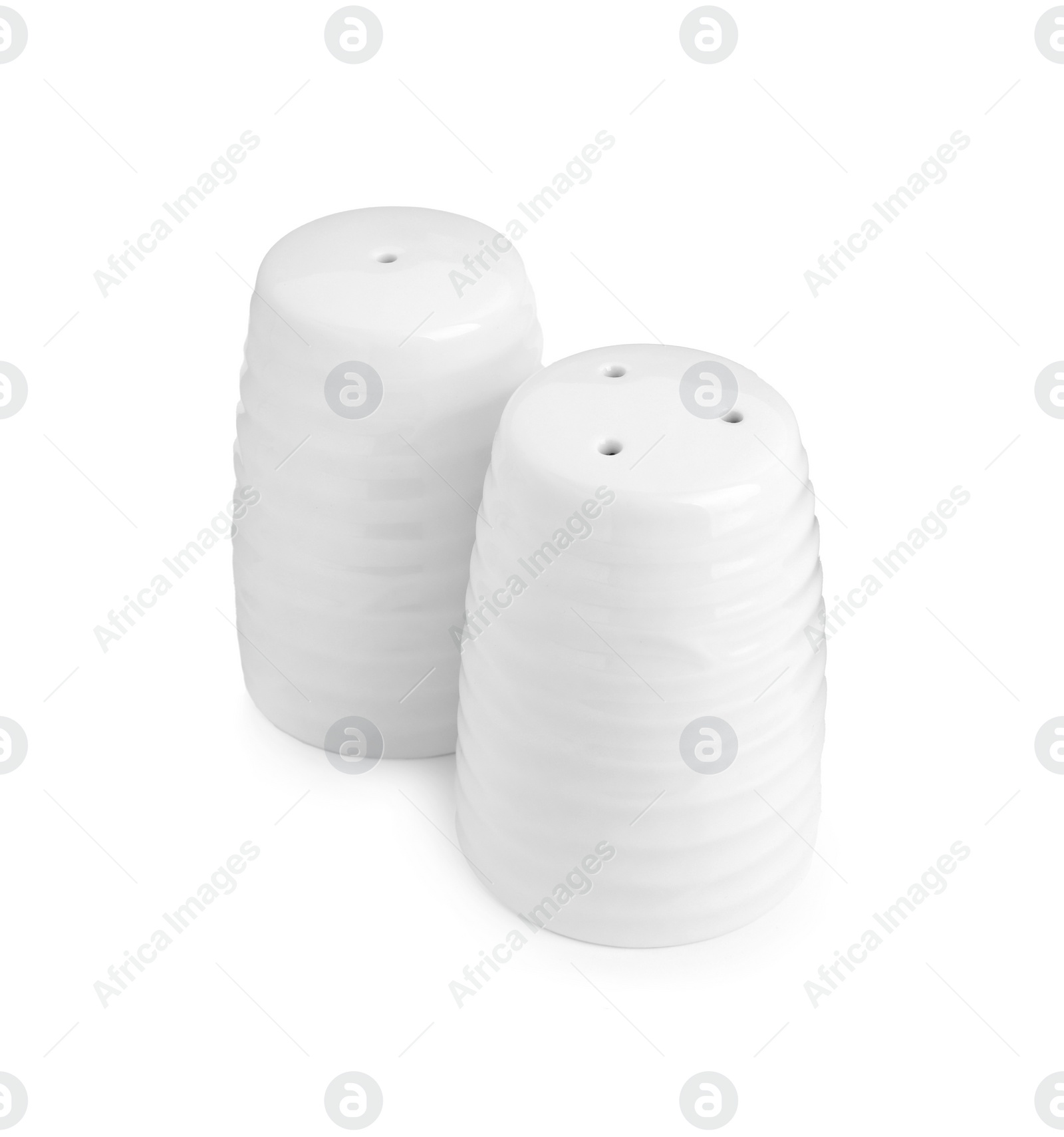 Photo of Ceramic salt and pepper shakers isolated on white