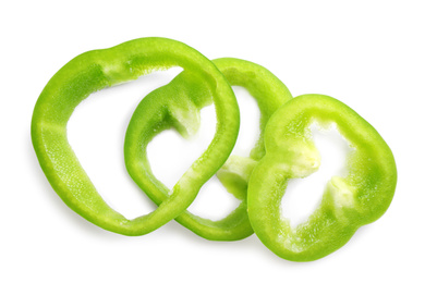 Photo of Slices of green bell pepper isolated on white