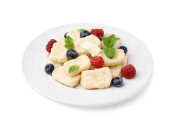 Plate of tasty lazy dumplings with berries, mint leaves and butter isolated on white