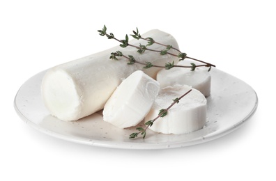 Delicious goat cheese with thyme on white background