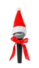 Microphone with Santa hat and red bow on white background. Christmas music