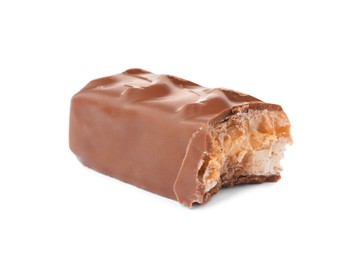 Photo of Piece of chocolate bar with caramel, nuts and nougat isolated on white