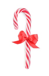 Sweet Christmas candy cane with red bow isolated on white, top view