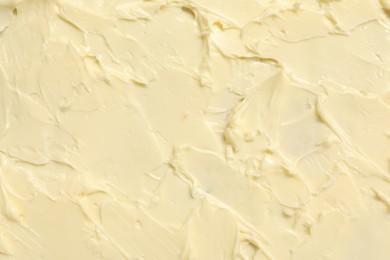 Photo of Texture of fresh natural butter as background, top view